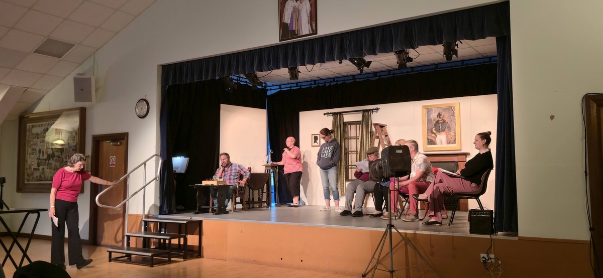 Anne as Gerry (the director of the play inside the play)